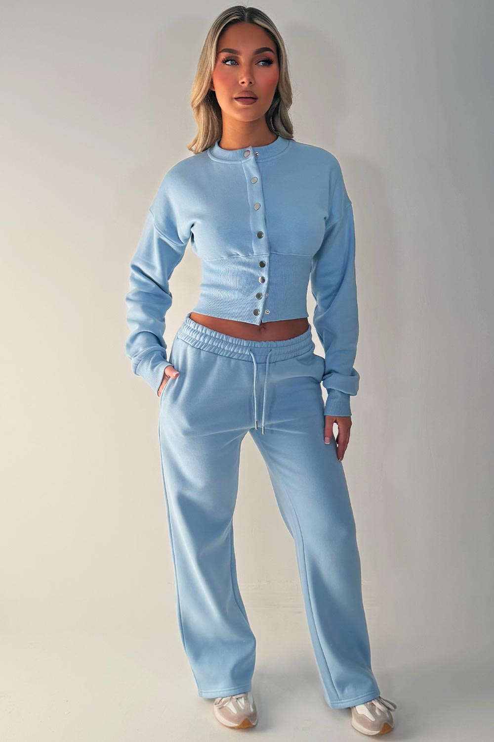 womens button up compress waist crop tracksuit styledup airport outfit travelling clothes styledup 