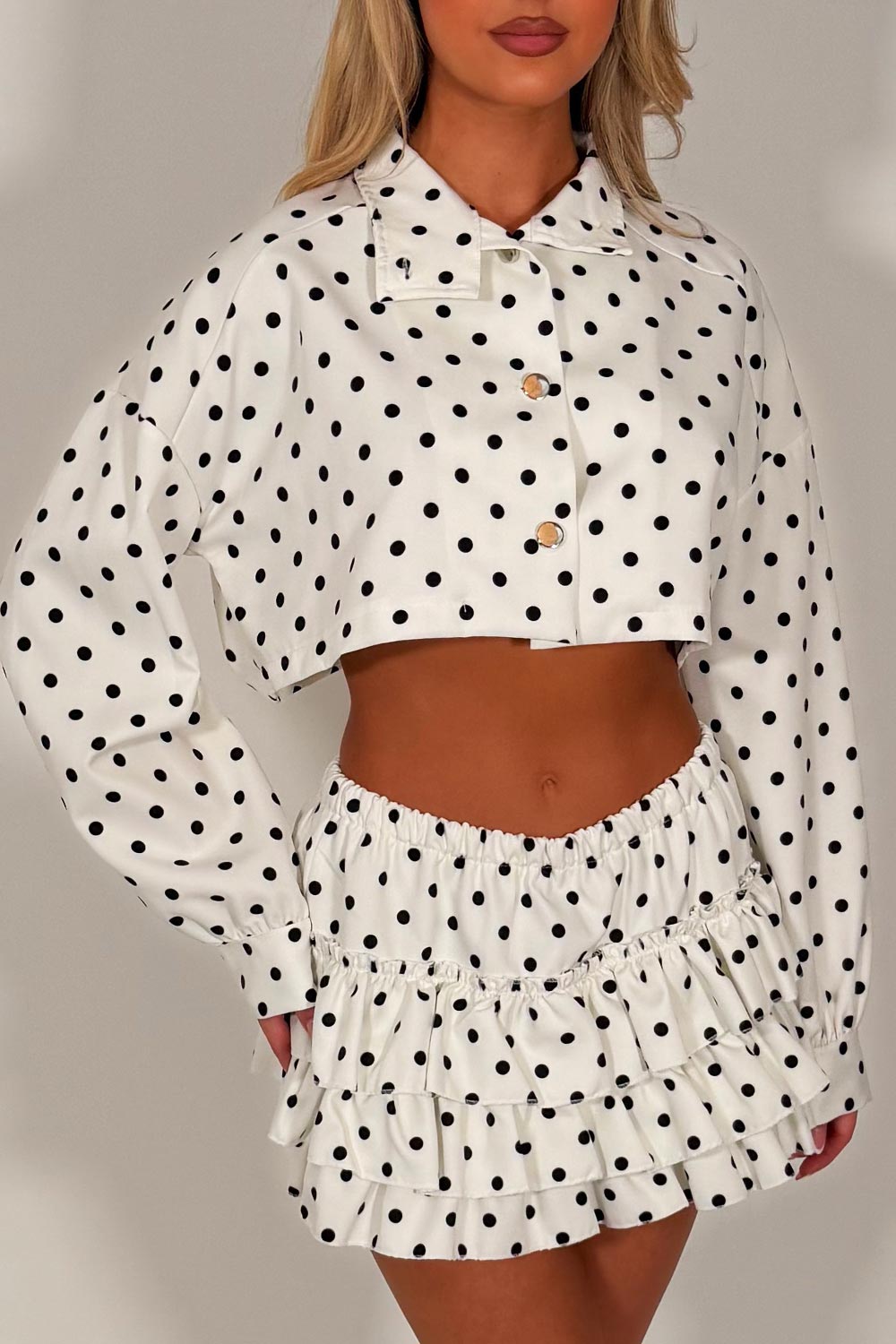 polka dot long sleeve crop jacket and ruffle frilly skort two piece set styledup going out outfits