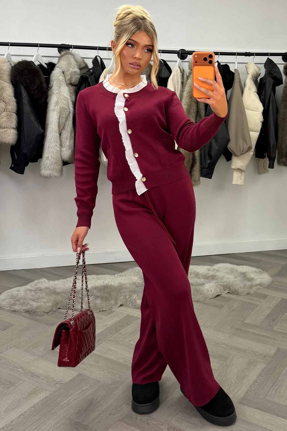 womens knitted wide leg trousers and jumper top with gold button detail night out Christmas party occasion outfit for winter uk