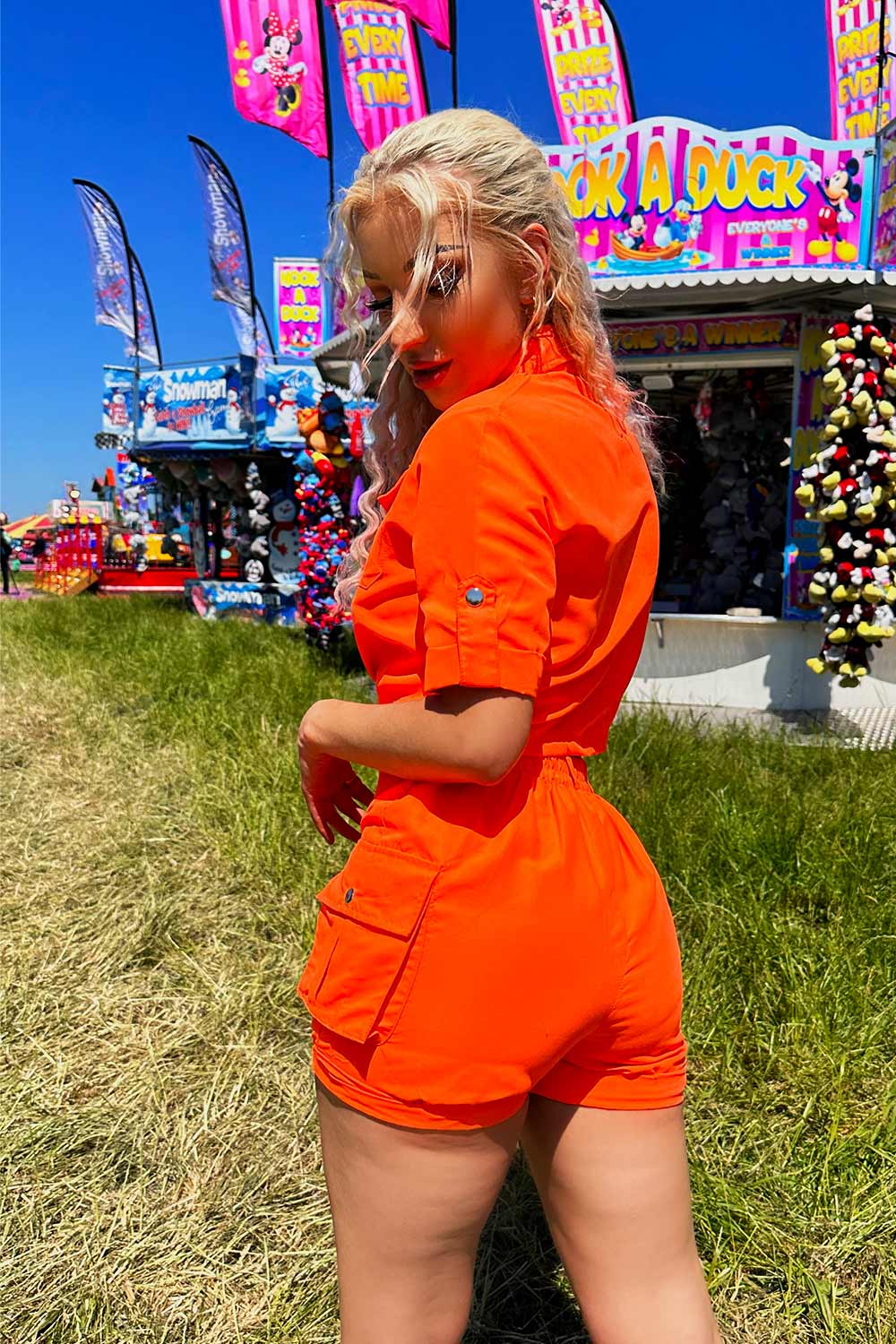 neon orange cargo shorts and crop top co ord festival rave outfit