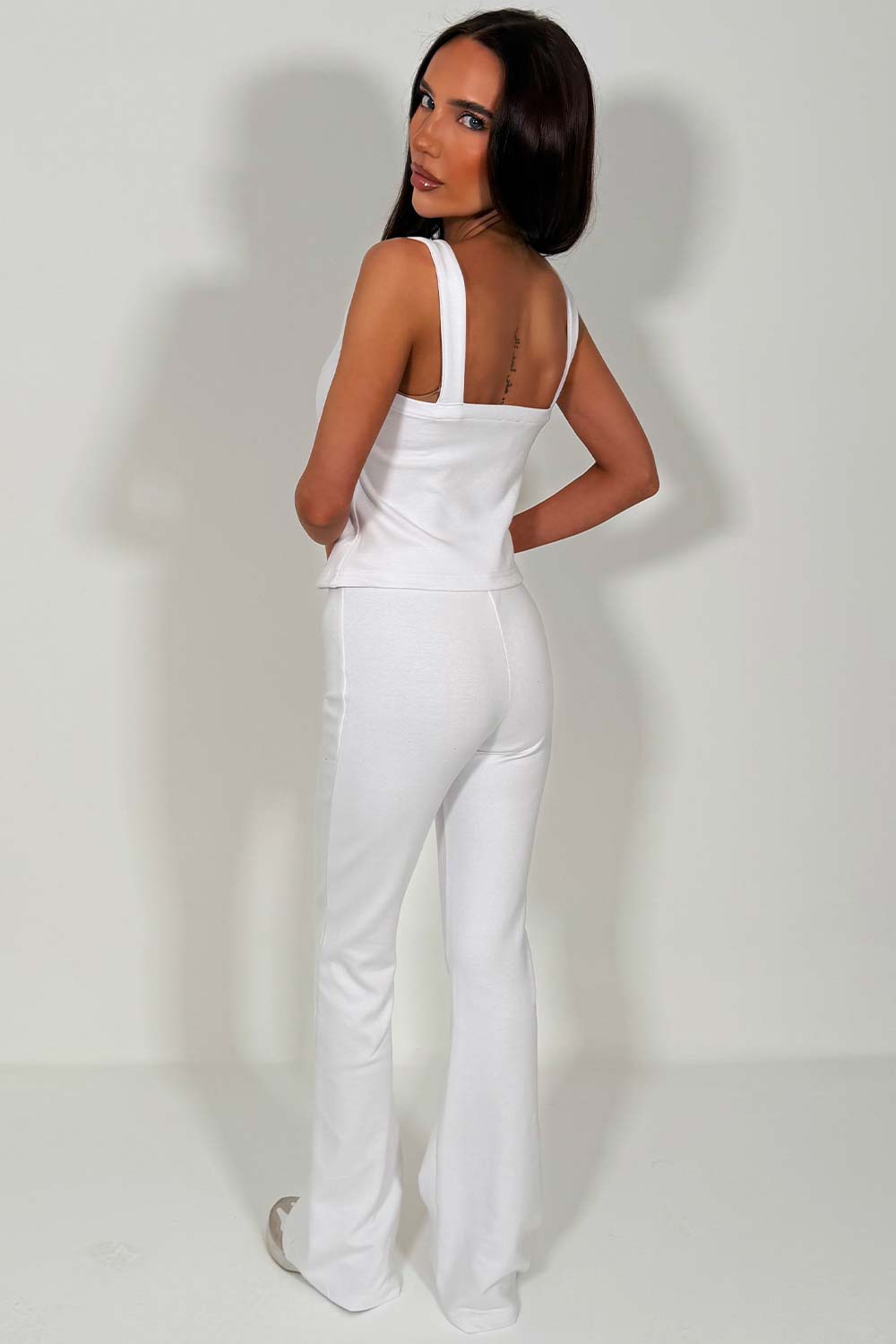 button up sleeveless top and skinny flare trousers co ord two piece airport outfit for womens zara uk styledup