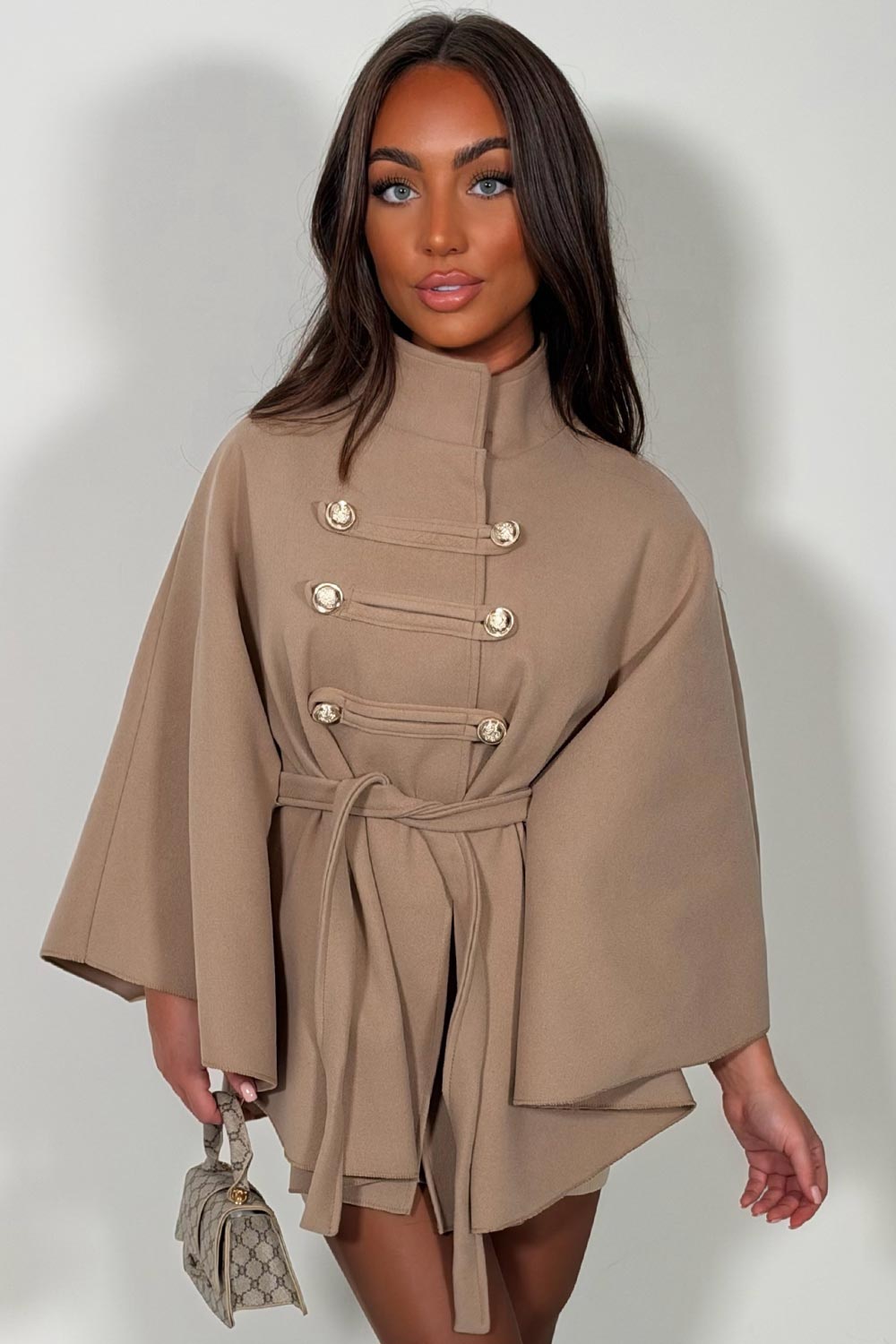 womens taupe cape with belt and button fastening christmas day outfit styledup