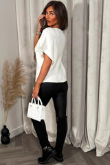 womens knitted cape cardigan with gold button christmas market outfit