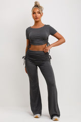 ruched side fold detail flare trousers and crop top co ord set womens