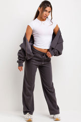 womens black tracksuit zip up sweatshirt joggers and baby tee 3 piece loungewear set styled up