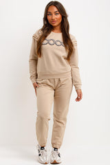frill shoulder gold button coco diamante top and trousers two piece tracksuit set airport outfit