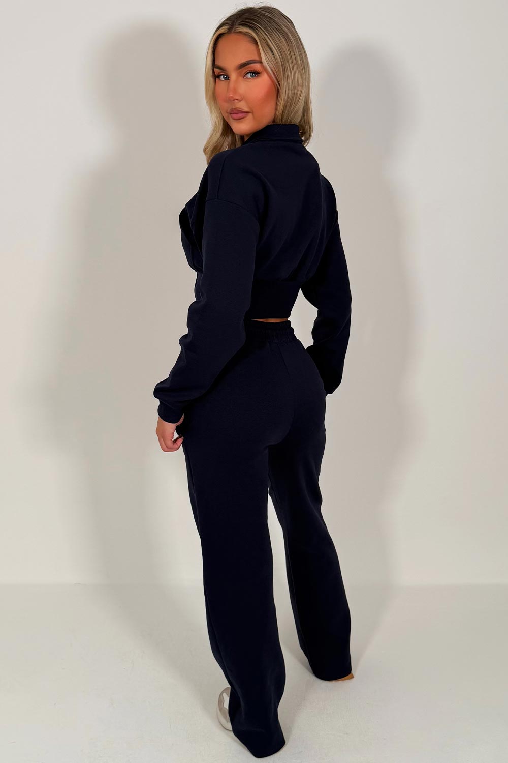 womens wide leg joggers and crop sweatshirt tracksuit airport outfit styledup