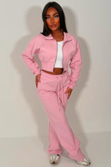 womens pink crop sweatshirt and wide leg joggers tracksuit airport outfit casual everyday outfit styledup uk