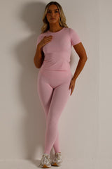 short sleeve sculpting stretch top and energy leggings set skims uk