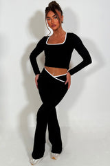 long sleeve yoga top and high rise v waist flare yoga pants styled up 