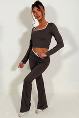 long sleeve yoga top and high rise v waist flare yoga pants styled up 