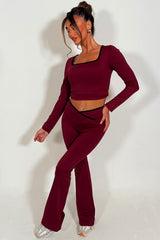 long sleeve yoga top and high rise v waist flare yoga pants styled up 