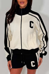 womens short tracksuit with c emblem styledup airport outfit zara uk