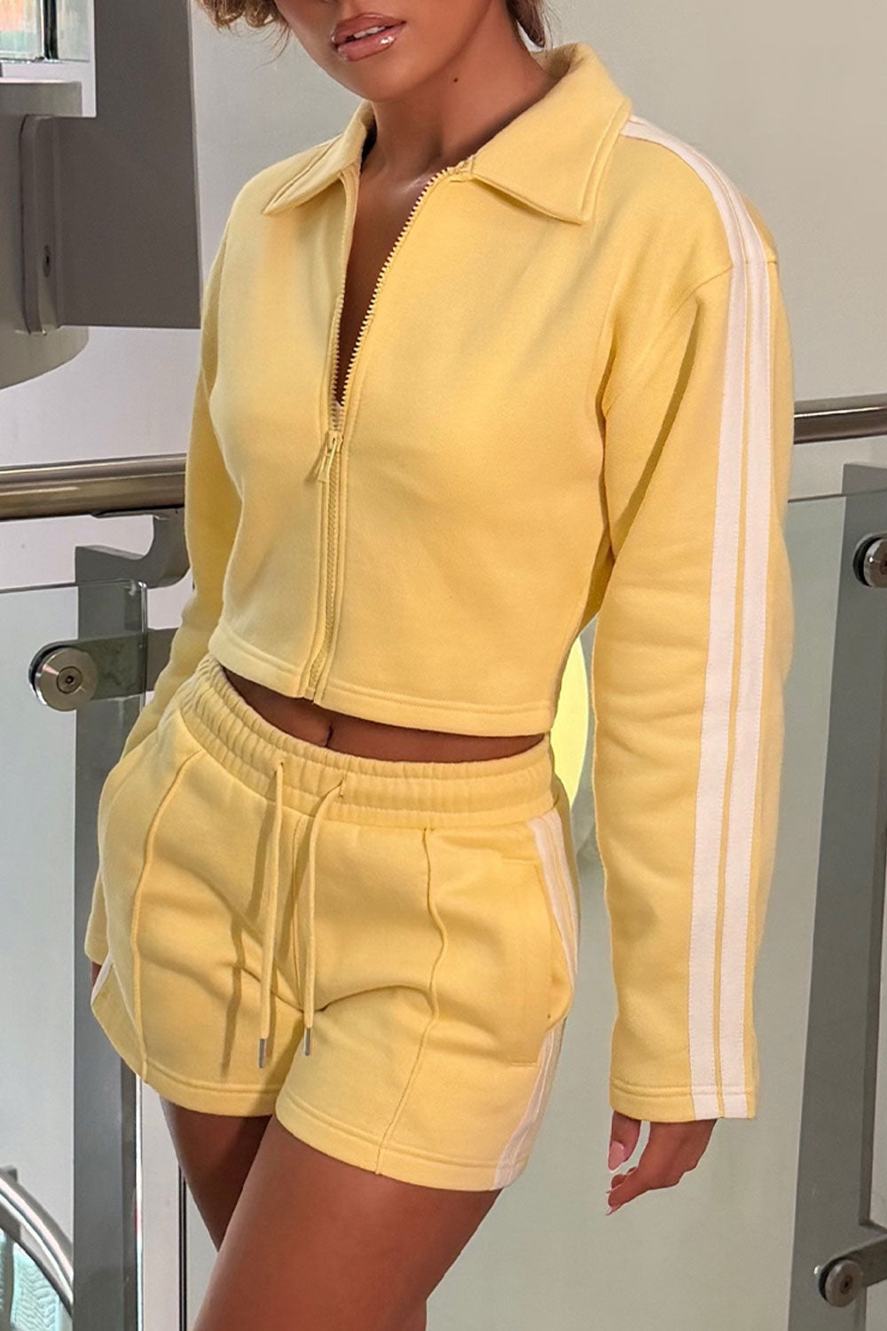 shorts and zip up crop sweatshirt two piece airport outfit summer holiday clothes styledup uk