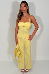 yellow corset top with straps going out festival night out outfit styledup 