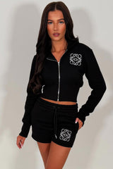 womens short tracksuit with embroidery detail airport outfit uk styledup tiktok