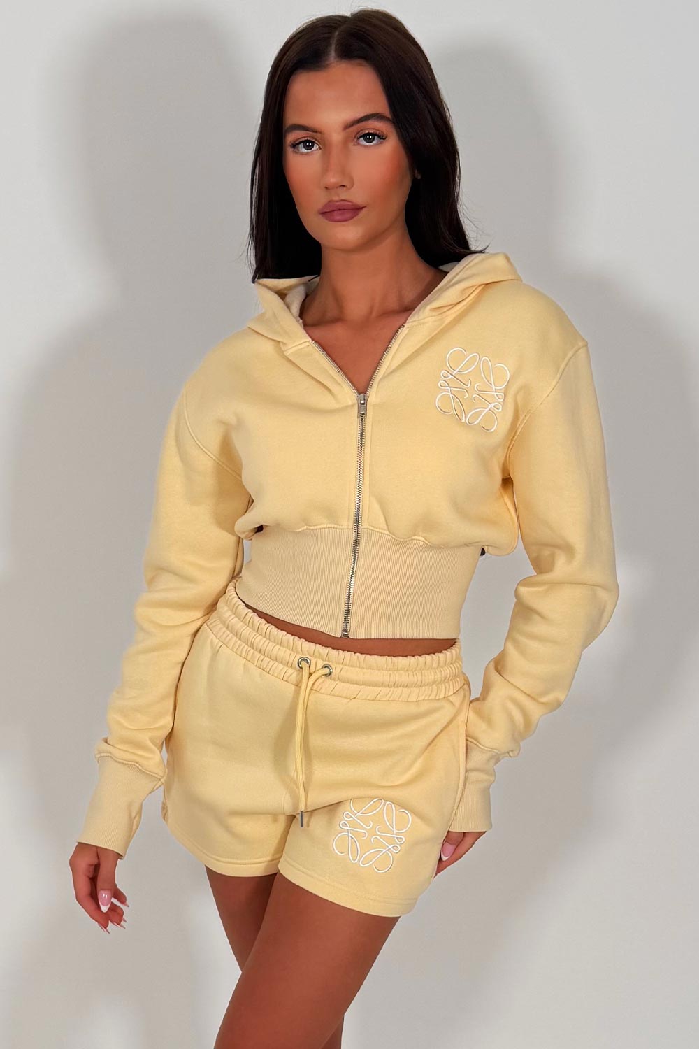 crop hoodie with cinched waist and shorts tracksuit with embroidery detail two piece co ord set airport outfit womens uk