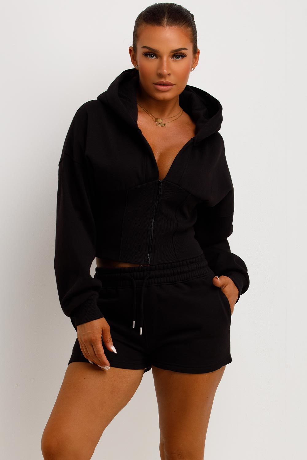 cinched waist crop corset hoodie and shorts tracksuit airport outfit co ord 