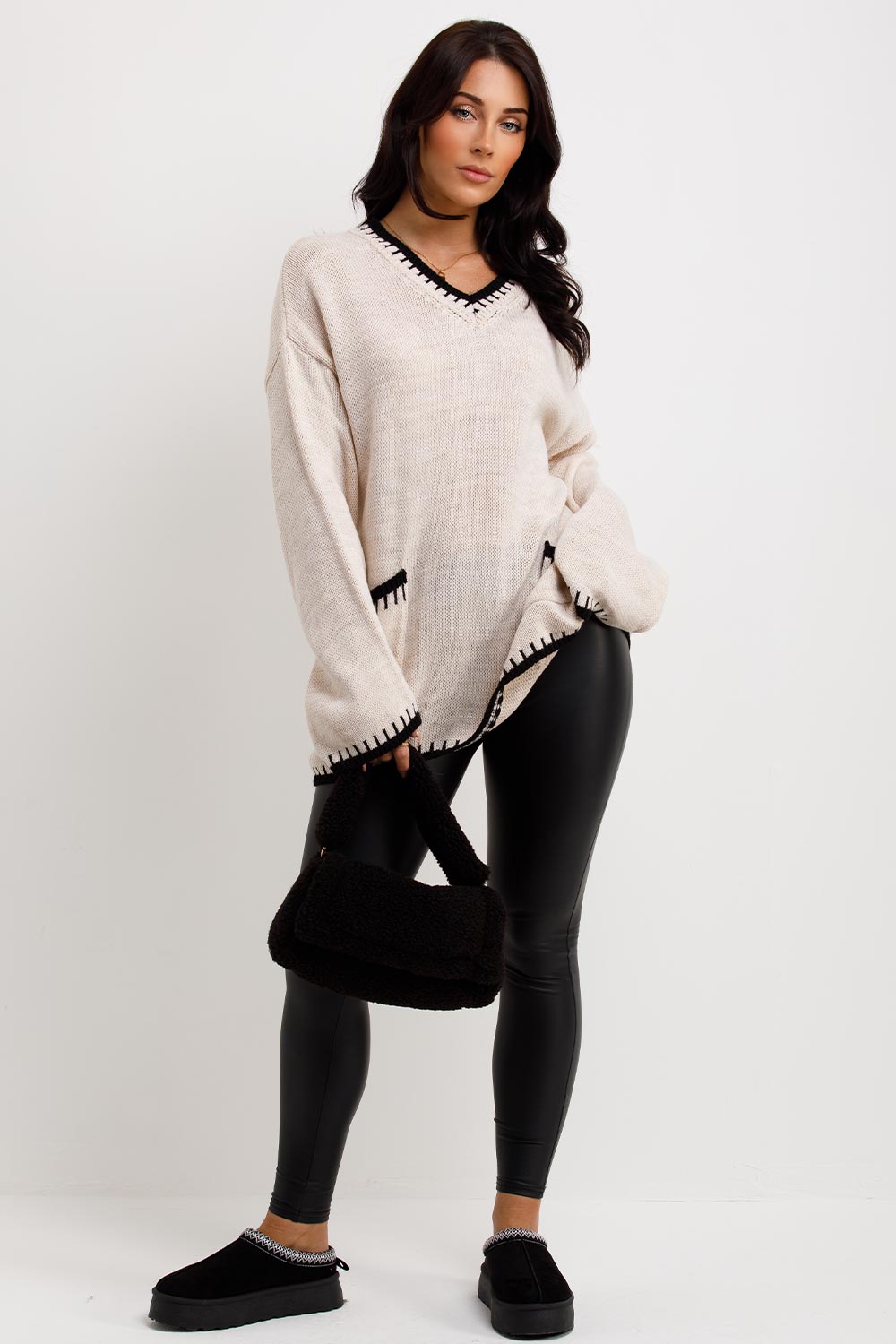 womens oversized knitted jumper with contrast stitches and front pockets