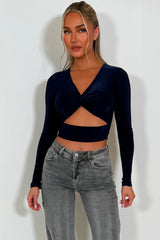 cut out long sleeve twist front festival top