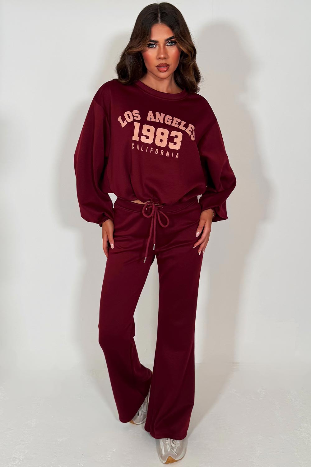 oversized sweatshirt jumper and flare trouser lounge set for womens with los angeles california slogan burgundy styledup 
