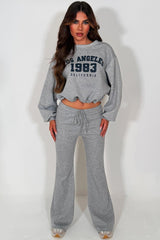 womens oversized crop sweatshirt and bell bottom flare trouser two piece loungewear co ord set grey with los angeles california slogan styledup