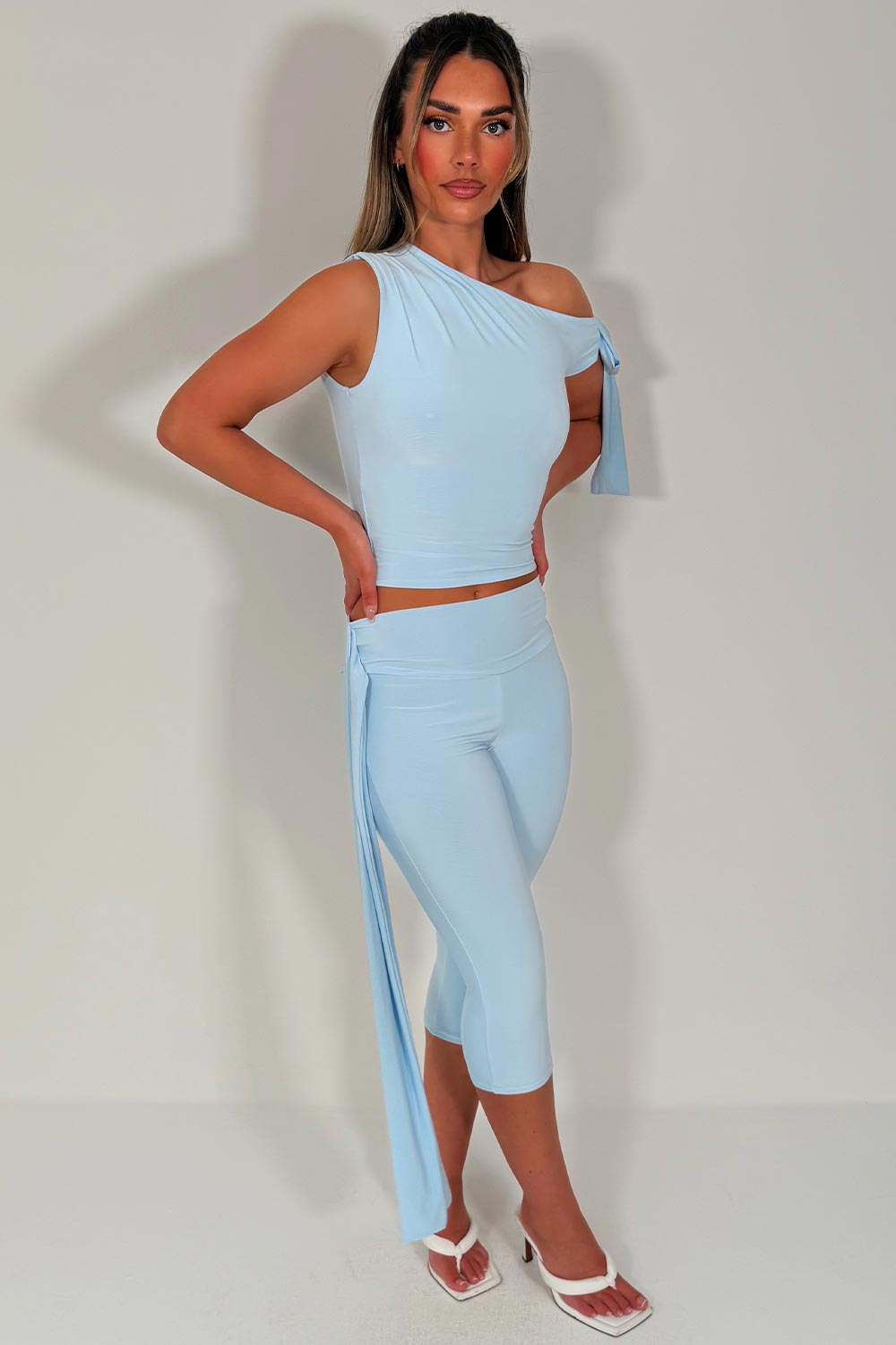 sky blue capri pants with side drape detail and asymmetric neckline crop top two piece co ord set night out occasion outfit for womens 
