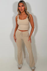 beige lululemon flare yoga leggings and top co ord set pilates outfit 