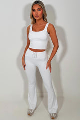 white lululemon flare yoga leggings and top co ord set pilates outfit 