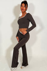 womens v waist high rise flared yoga pants and long sleeve top co ord activewear alo yoga uk