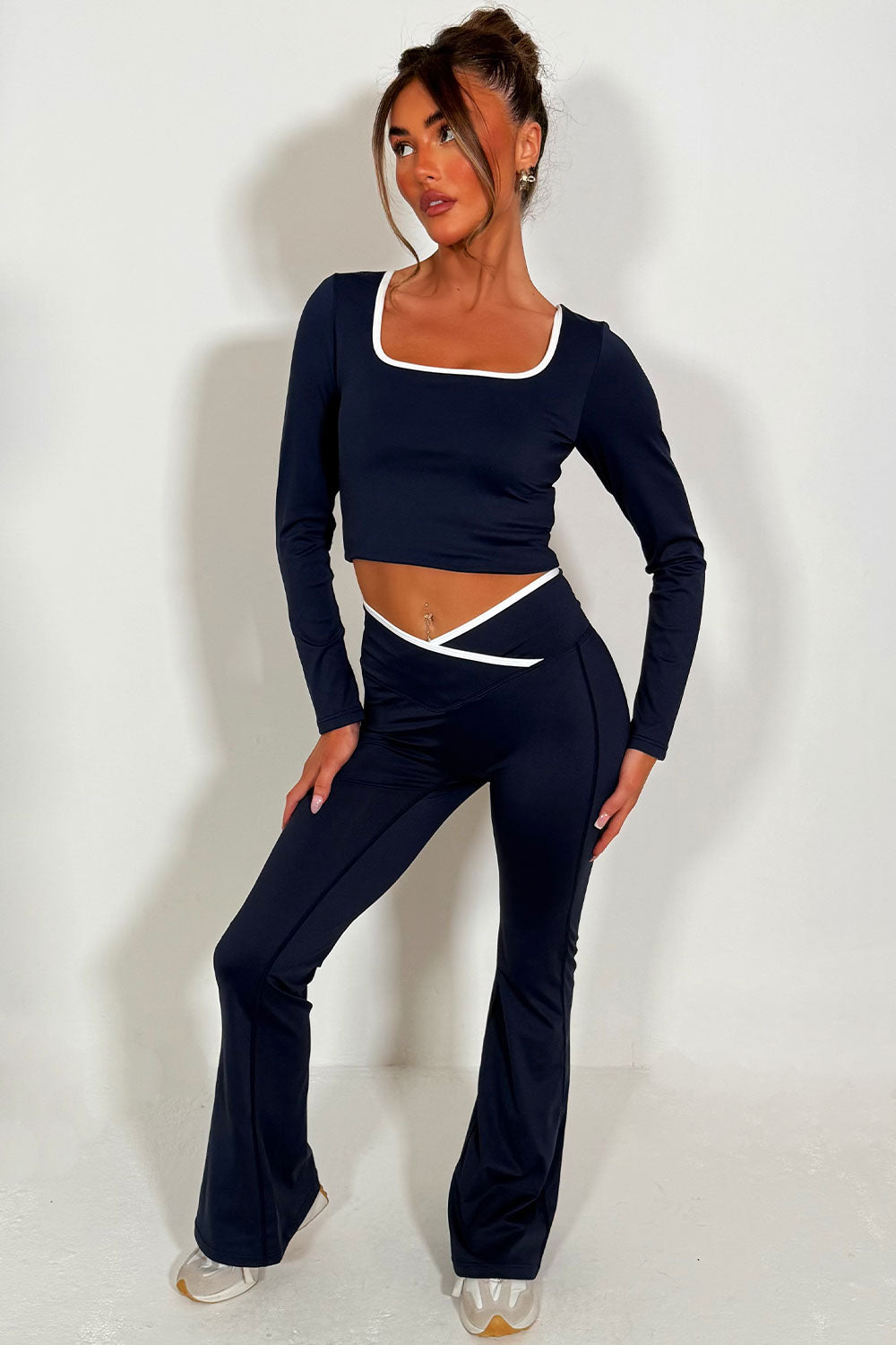 womens v waist high rise flared yoga pants and long sleeve top co ord activewear alo yoga uk