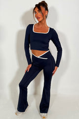 womens v waist high rise flared yoga pants and long sleeve top co ord activewear alo yoga uk