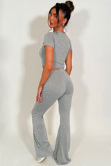 flared trousers and cut out heart detail cap sleeve crop top co ord set styled up 