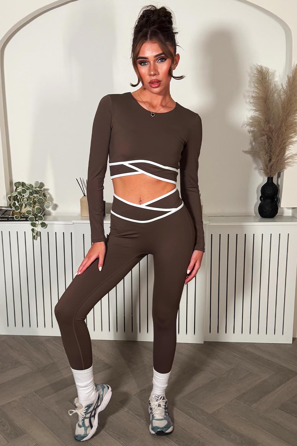 lululemon crossover waist high rise leggings and long sleeve crop top two piece co ord set brown activewear for gym yoga and pilates 