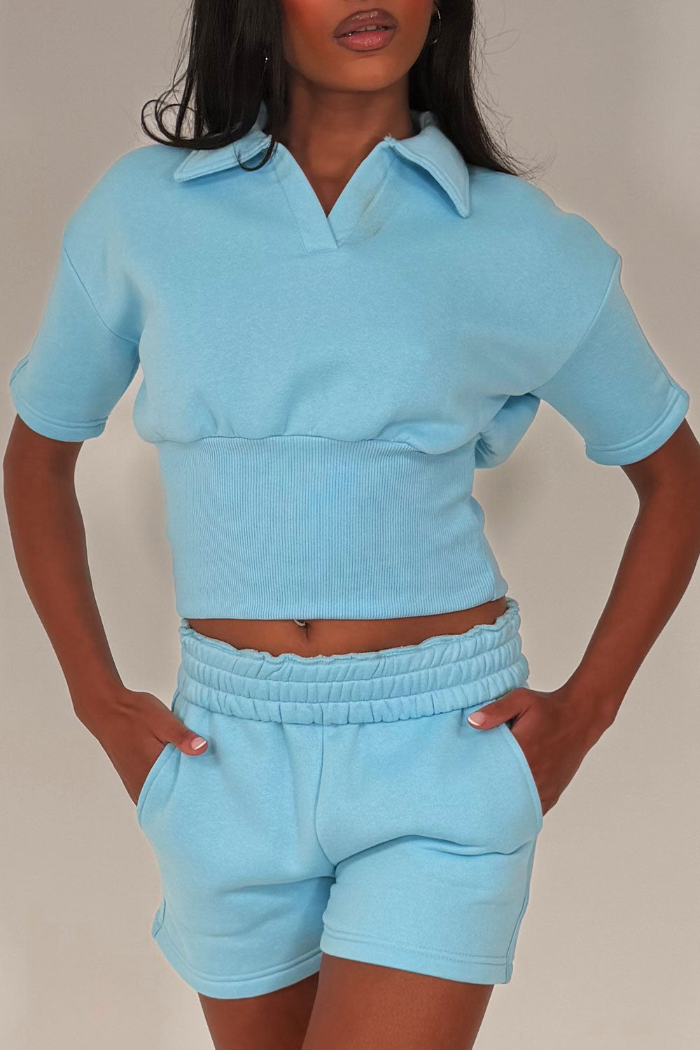 polo top and shorts two piece airport outfit styledup