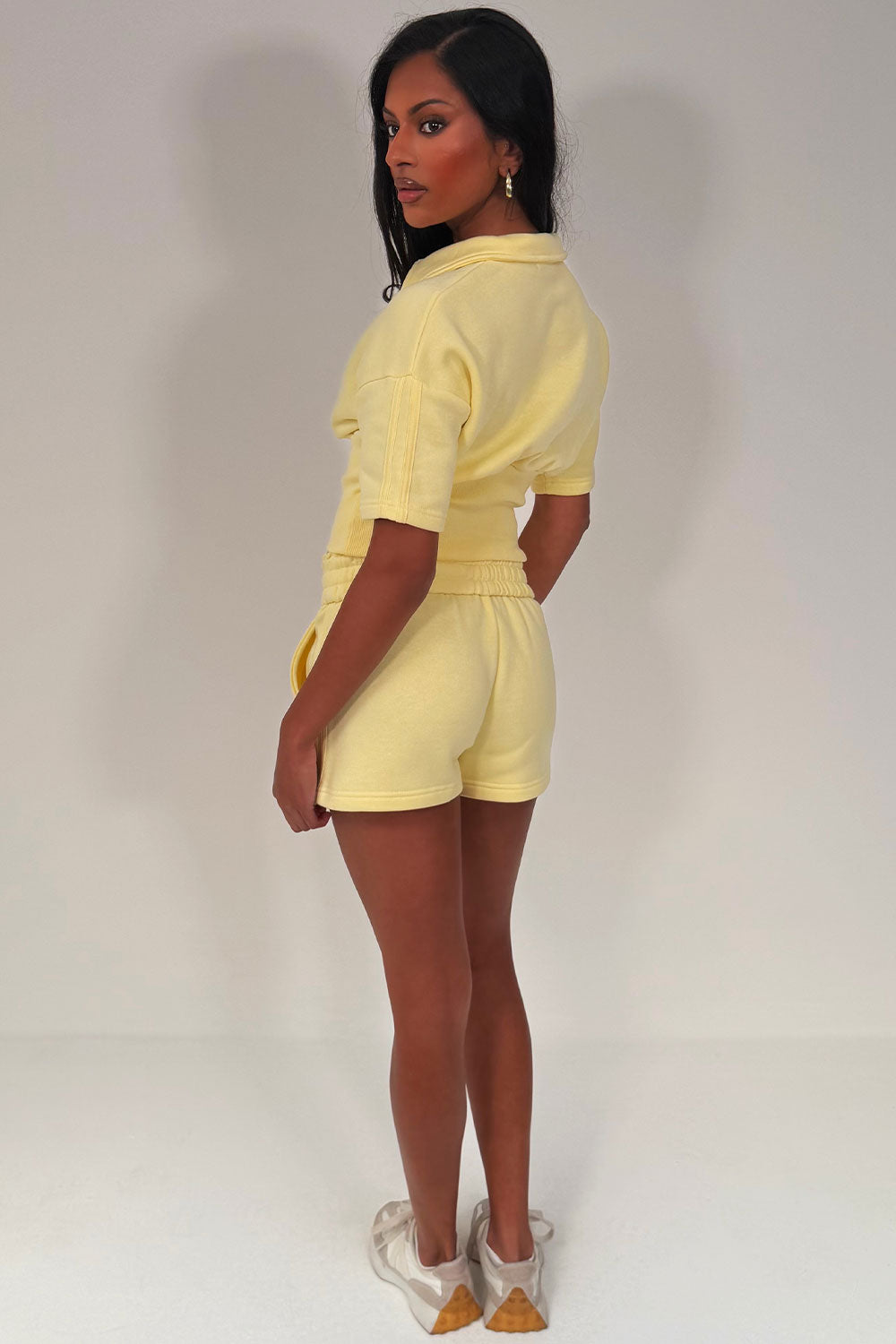 polo top and shorts two piece airport outfit styledup