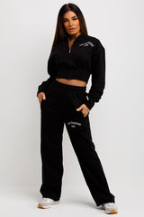womens straight leg tracksuit black cropped zipper jacket and straight leg joggers co ord set