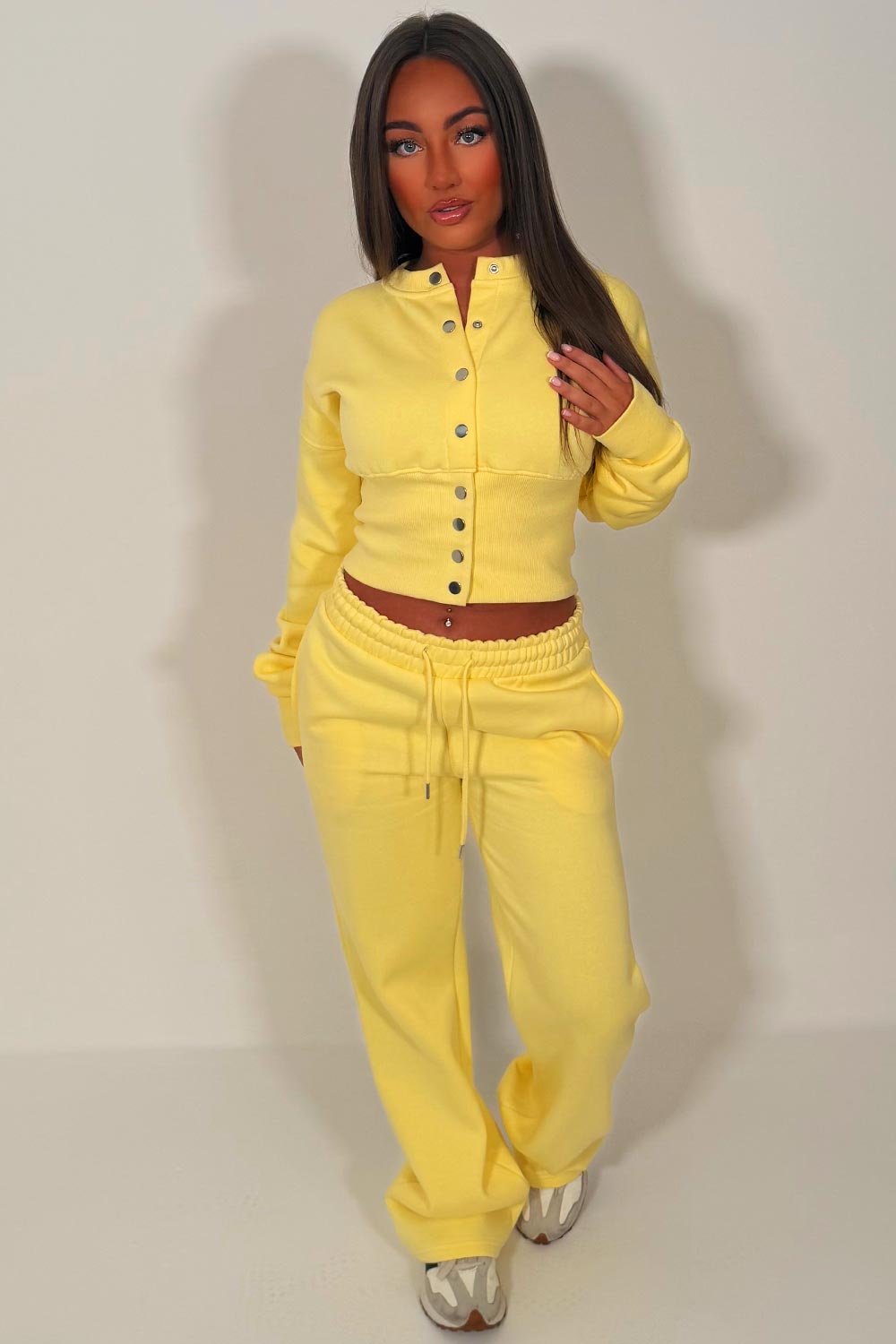 womens button up compress waist crop tracksuit styledup airport outfit travelling clothes styledup 