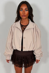 funnel neck bomber jacket with long sleeves plated gathered shoulders styledup uk