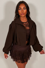 womens brown bomber jacket with funnel nect long sleeves button fastening styledup uk