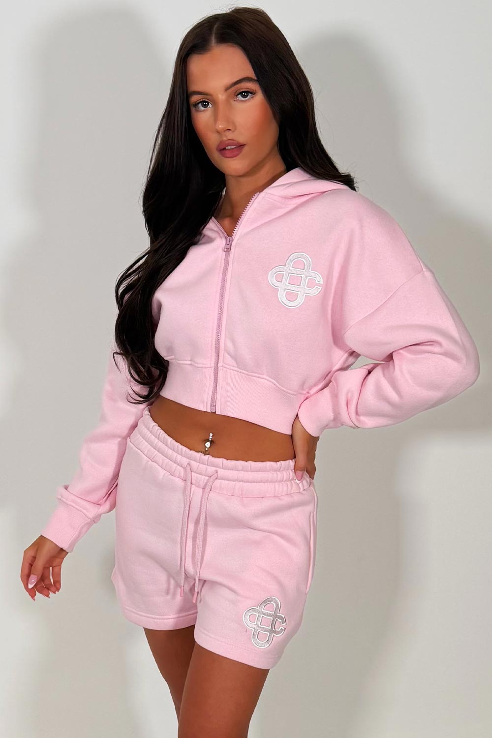 crop hoodie with cinched waist and shorts tracksuit two piece co ord set airport outfit womens uk