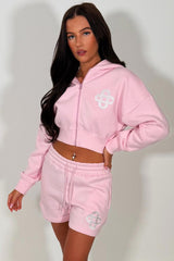 crop hoodie with cinched waist and shorts tracksuit two piece co ord set airport outfit womens uk