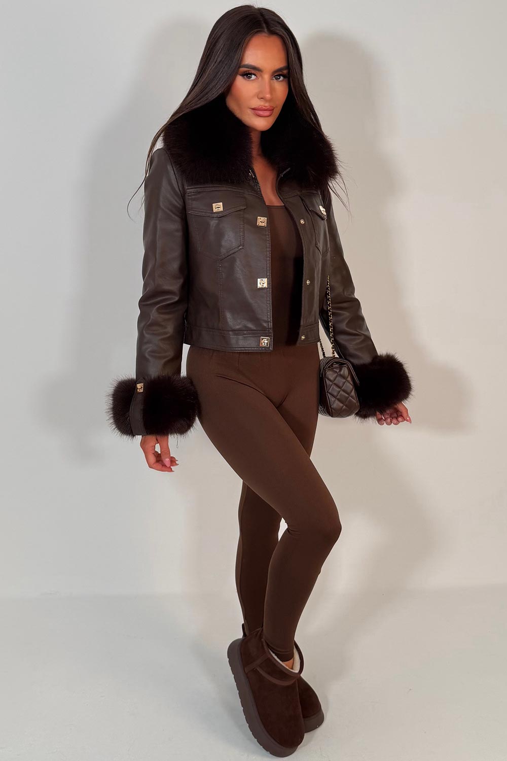 faux fur cuff and collar faux leather bomber jacket with gold buttons styledup womens outerwear christmas outfit 