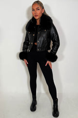 womens fur cuff and collar faux leather jacket with gold buttons styled up