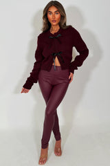 womens burgundy knitted cardigan with satin bow tie front christmas party outfit styledup