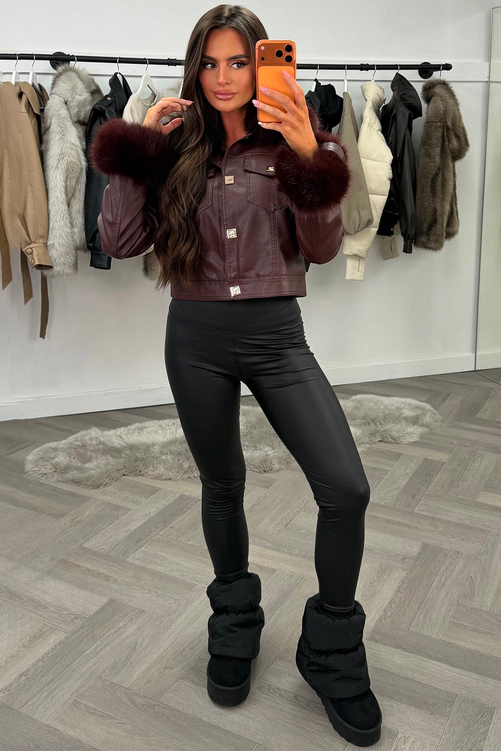 womens fur cuff and collar faux leather jacket with gold buttons styled up