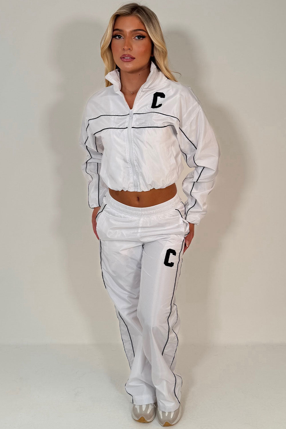 white crop funnel neck jacket and track trousers summer holiday festival outfit styledup uk