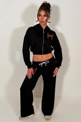 womens tracksuit set with letter H detail casual everyday outfit perfect for airport and travelling 