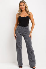 cross applique wide leg denim jeans styledup