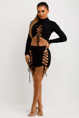 short cut out lace up skirt and long sleeve high neck crop top festival rave going out outfit